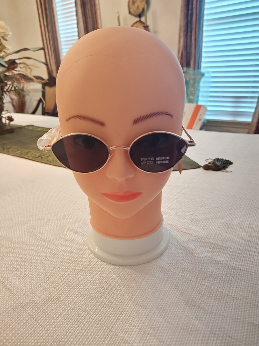 FRYE AND CO. Gold Frame Sunglasses with Dark Lenses
